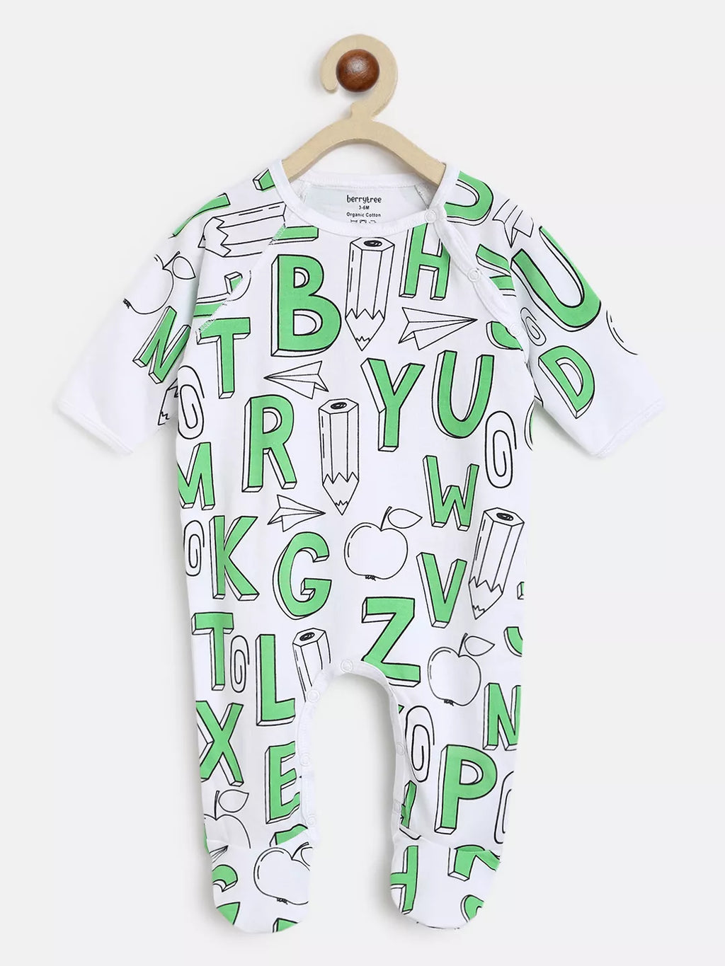 White baby romper with green letters and symbols on a white background