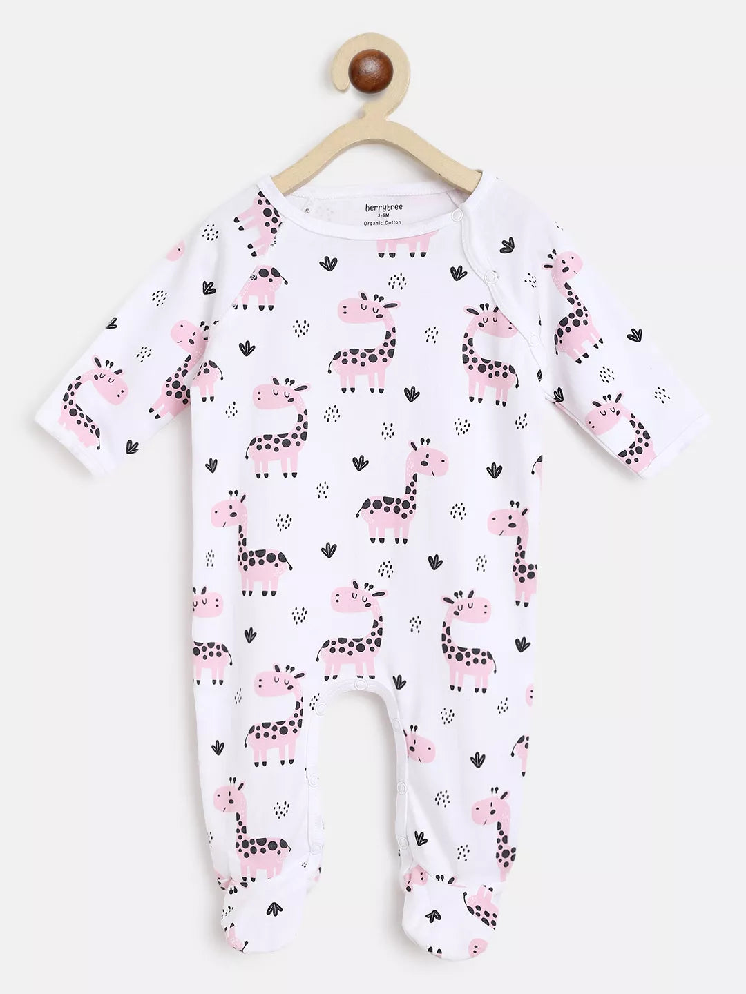 Baby onesie with pink giraffe pattern on a white background