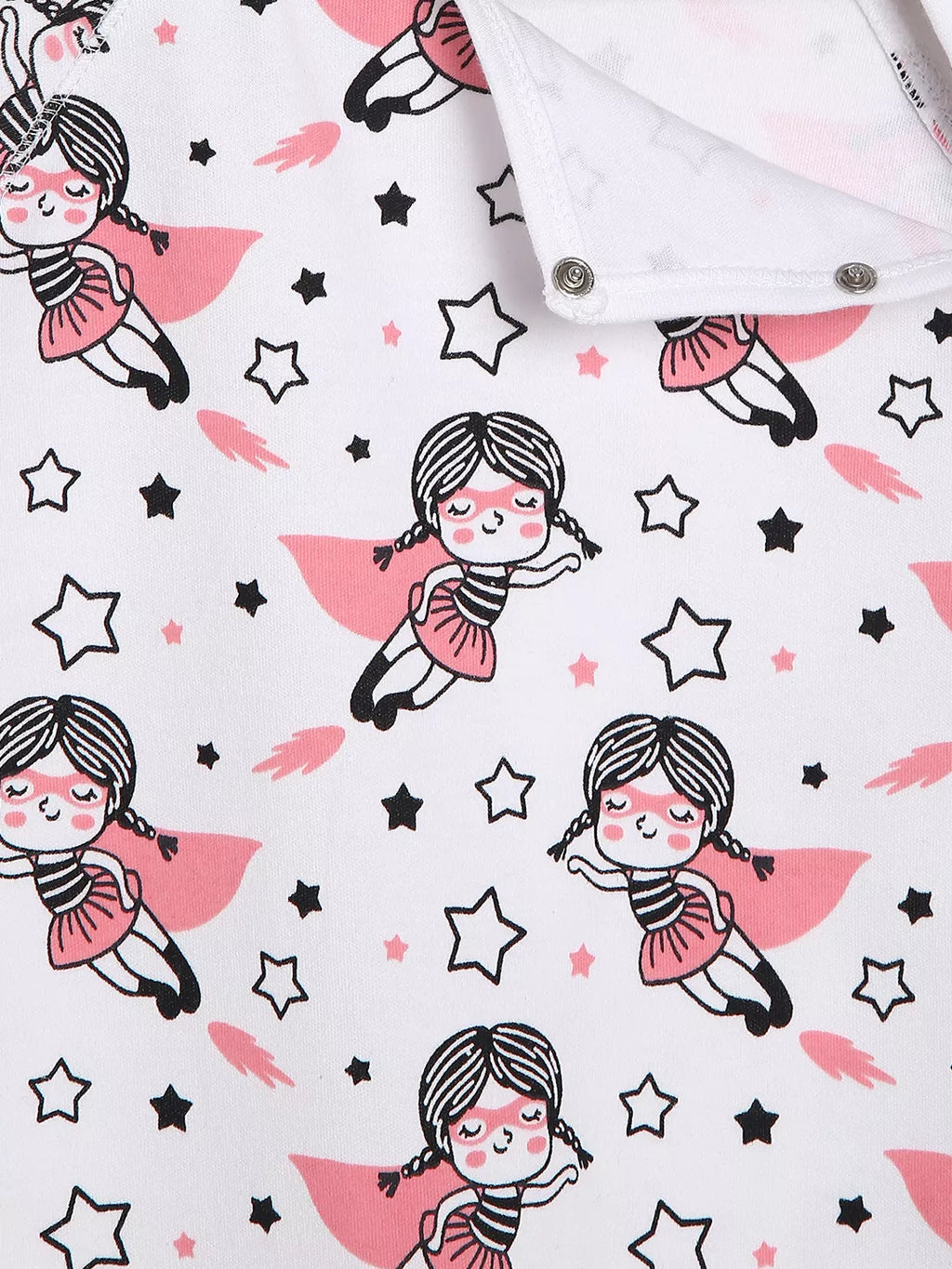 Fabric with fairy pattern featuring girls in pink capes and black stars on a white background.