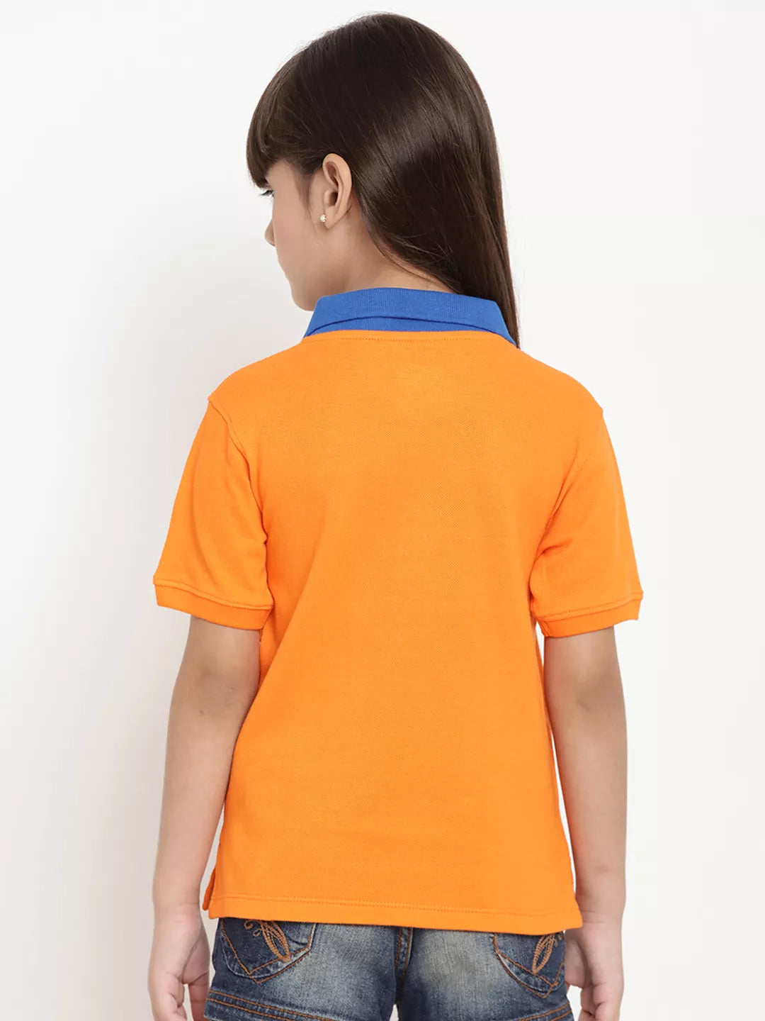 Person wearing an orange polo shirt with a blue collar on a white background