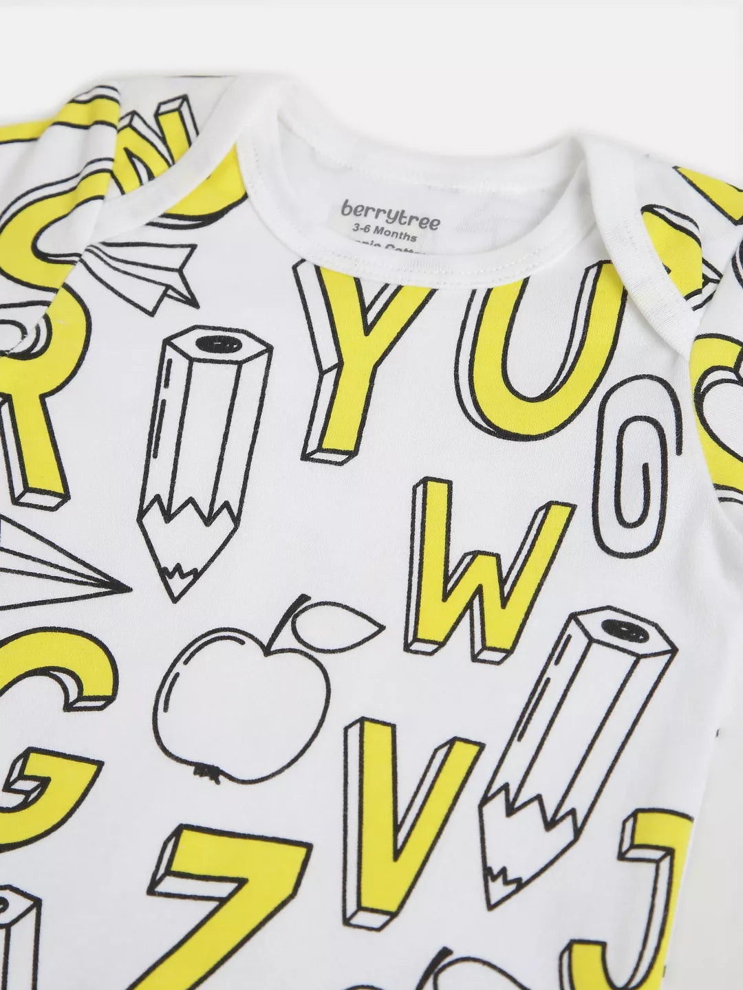 White baby onesie with yellow alphabet letters and black outlines on a white background