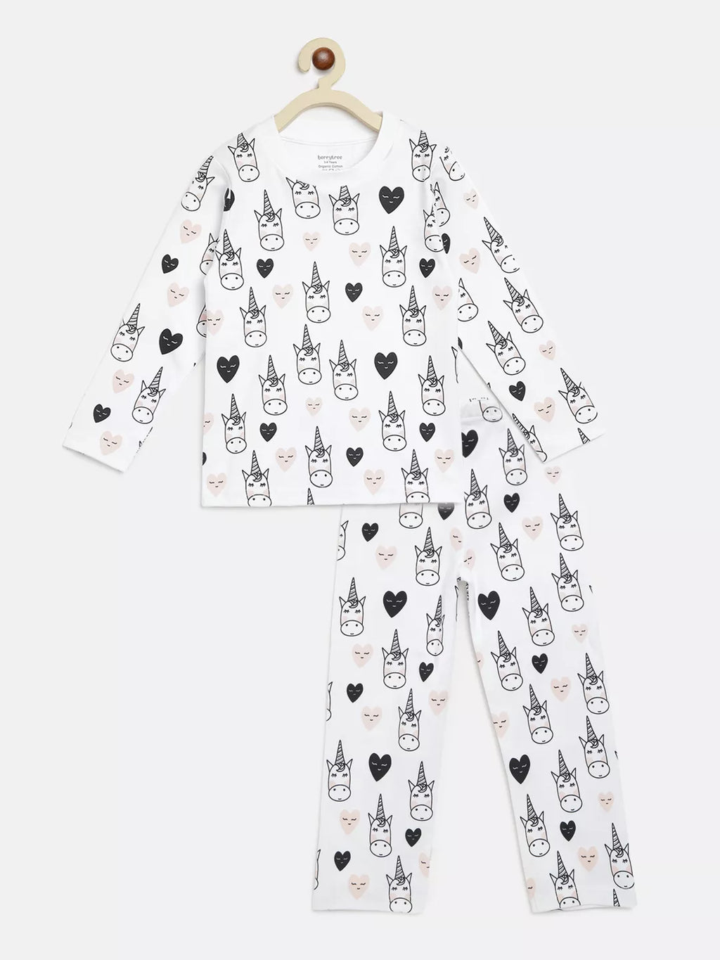 Children's pajama set with unicorn and heart pattern on a white background