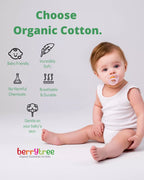 Baby sitting on a white blanket with organic cotton benefits displayed and Berrytree branding.