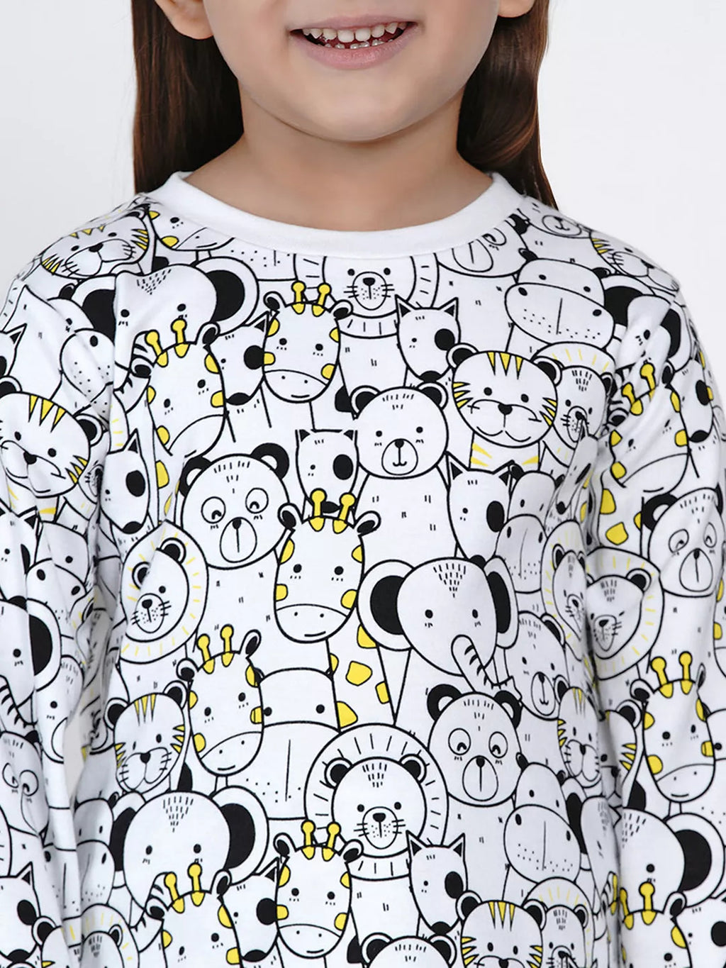 Child wearing a shirt with black and white animal pattern