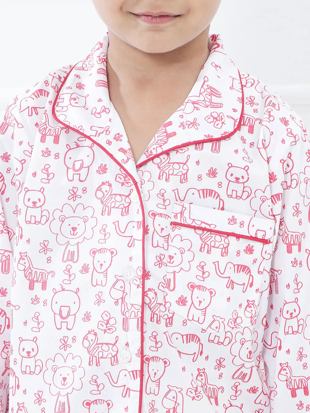 Child wearing pajamas with animal pattern
