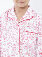 Child wearing pajamas with animal pattern