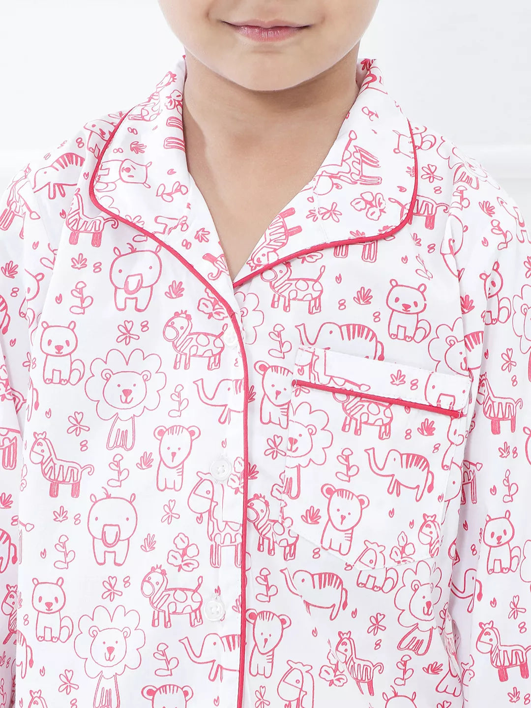 Child wearing pajamas with animal pattern
