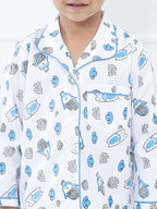 Child wearing a white shirt with blue hedgehog pattern