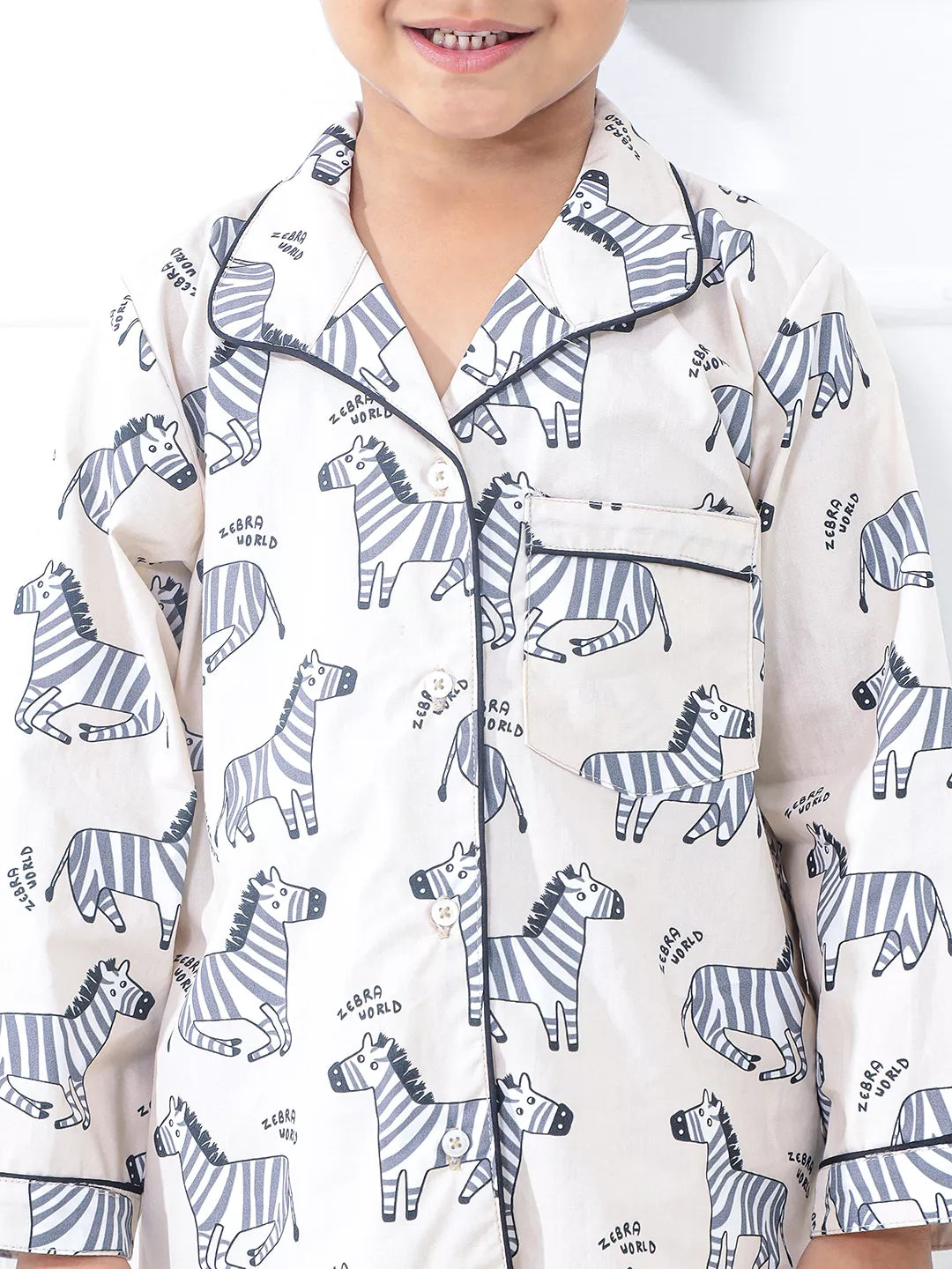 Child wearing pajamas with zebra pattern