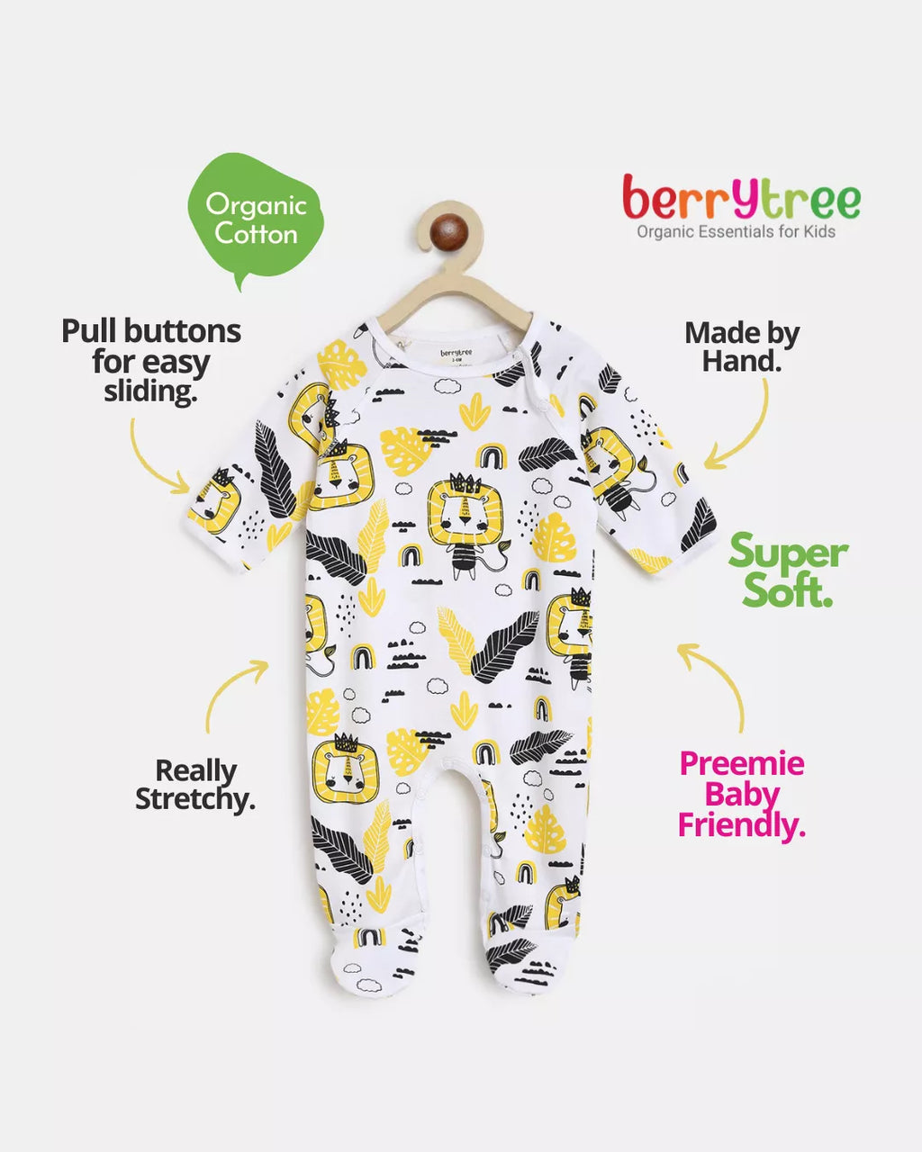 Baby onesie with yellow and black patterns on a white background, featuring text about the product's features.