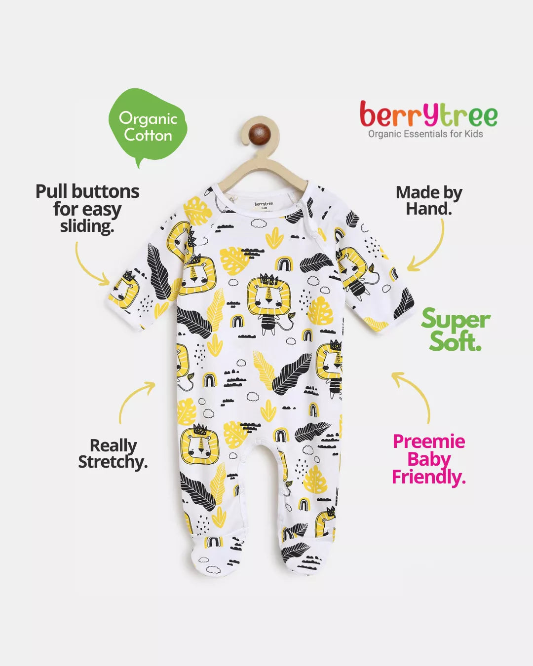 Baby onesie with yellow and black patterns on a white background, featuring text about the product's features.